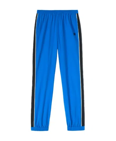 Ambush Stripe-detailing Logo-print Track Pants In Blue