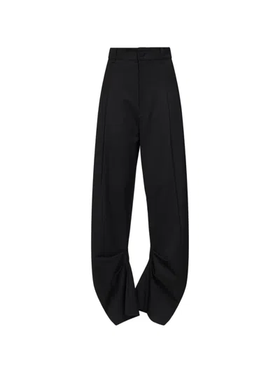 Amen Pleated Curved-leg Trousers In Black