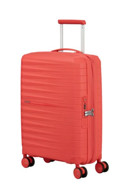 American Tourister Fastfoward Expandable Hardside 22" Carry On Spinner In Orange