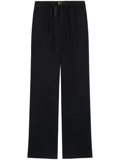 AMI ALEXANDRE MATTIUSSI AMI FLARED TROUSERS WITH RELAXED FIT