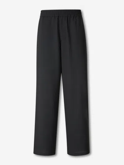 AMI ALEXANDRE MATTIUSSI AMI PARIS ELASTIC WOOL TROUSERS