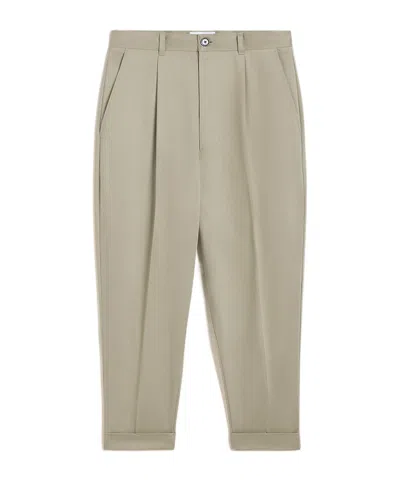 Ami Alexandre Mattiussi Pressed-crease Tapered Trousers In Nude