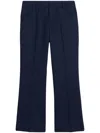 Ami Alexandre Mattiussi Flared Mid-rise Wool Blend Trousers In Bleu Nautique