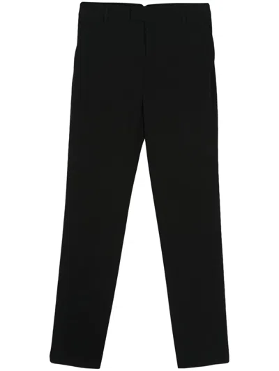 AMI ALEXANDRE MATTIUSSI CREPE TAPERED-LEG TROUSERS