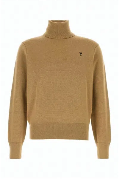 AMI ALEXANDRE MATTIUSSI CROPPED MERINO WOOL TURTLENECK SWEATER WITH RIBBED DETAILS