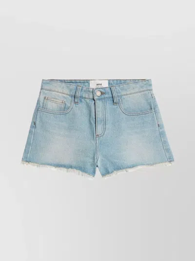 AMI ALEXANDRE MATTIUSSI DENIM SHORTS WITH RAW-CUT HEM AND CONTRAST STITCHING
