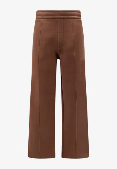 Ami Alexandre Mattiussi Embossed Logo Wide-leg Pants In Brown