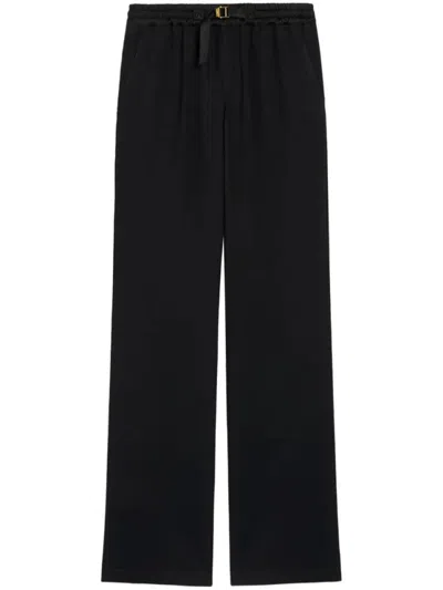 AMI ALEXANDRE MATTIUSSI FLARED TROUSERS WITH RELAXED FIT