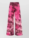 AMI ALEXANDRE MATTIUSSI LARGE FIT DENIM TROUSERS WITH WIDE LEG AND TIE-DYE PATTERN