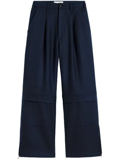 Ami Alexandre Mattiussi Pleat-detailing Wool Trousers In Navy Blue