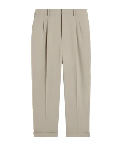 AMI ALEXANDRE MATTIUSSI AMI PARIS PLEAT DETAILED TAPERED TROUSERS