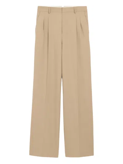 Ami Alexandre Mattiussi Ami Paris Low Waist Trousers For Men - Ss26 Collection In Brown