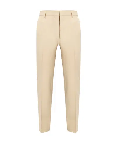 Ami Alexandre Mattiussi Pressed-center Cropped Trousers In Nude