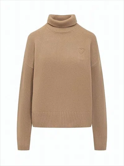 AMI ALEXANDRE MATTIUSSI RIBBED KNIT TURTLENECK SWEATER WITH EMBROIDERED HEART LOGO