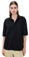 Ami Alexandre Mattiussi Ami V-neck Polo Shirt With Oversized Fit In Black