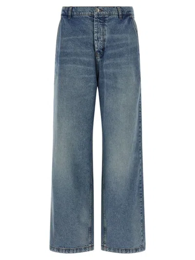 AMI ALEXANDRE MATTIUSSI STONEWASHED DENIM JEANS