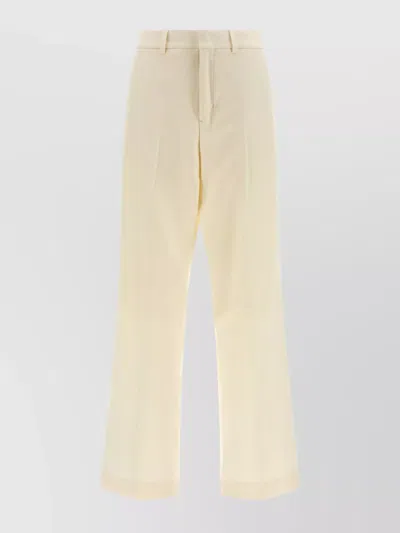 AMI ALEXANDRE MATTIUSSI TAILORED TROUSERS WITH PLEATS AND POCKETS
