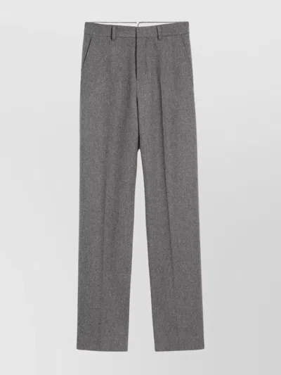 AMI ALEXANDRE MATTIUSSI TAILORED WOOL TROUSERS FEATURING PLEATED FRONT