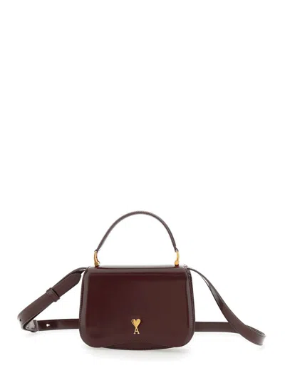 AMI ALEXANDRE MATTIUSSI BORDEAUX HANDBAG WITH ADC PATCH ON THE FRONT AND ADJUSTABLE AND REMOVABLE SHOULDER STRAP IN LEATHER 