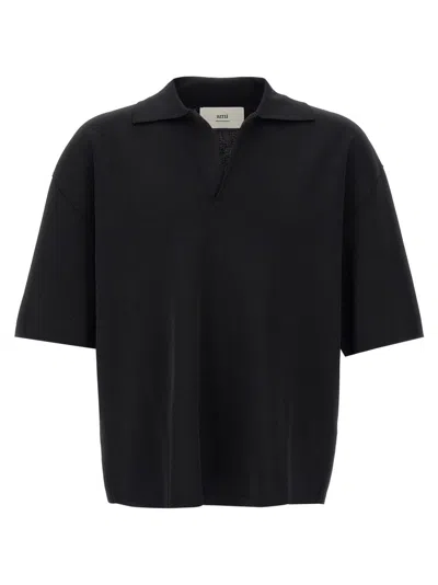 AMI ALEXANDRE MATTIUSSI V-NECK POLO SHIRT WITH OVERSIZED FIT