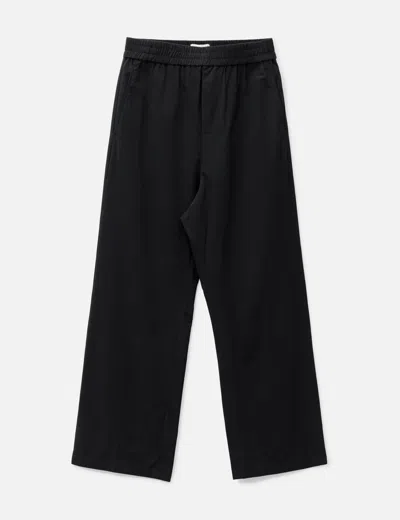 Ami Alexandre Mattiussi Wide Elasticated Waist Trousers In Black