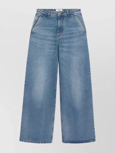 AMI ALEXANDRE MATTIUSSI WIDE LEG DENIM TROUSERS FEATURING POCKETS
