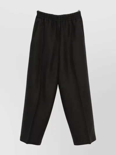 AMI ALEXANDRE MATTIUSSI WIDE-LEG TROUSERS FEATURING ELASTIC WAISTBAND