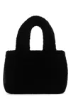 Amina Muaddi Shearling Handbag With Twin Handles And Structured Silhouette In Black