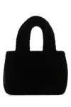 Amina Muaddi Shearling Handbag With Twin Handles And Structured Silhouette