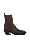 Amina Muaddi Chelsea Boot With Block Heel And Square Toe In Brown