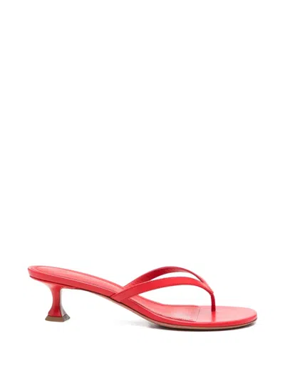 Amina Muaddi Juliette Nappa Leather Thong Kitten Mules In Red
