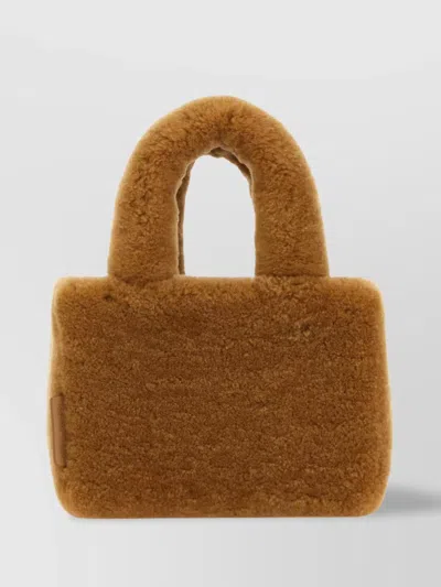 AMINA MUADDI RECTANGULAR SHEARLING HANDBAG WITH TOP HANDLE