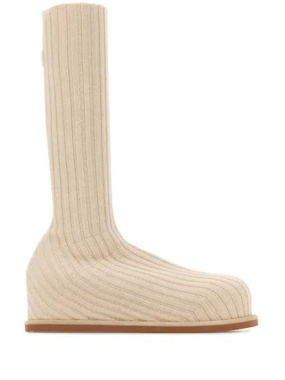 Amina Muaddi Ribbed Texture Flat Sole Sock-like Boots In Beige