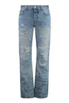 Amiri Men Blue Jeans With Ripped Details On The Front And Logo Patch On The Rear In Denim Man In Denim