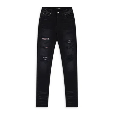 Amiri Aged Black Hibiscus Artpatch Jeans