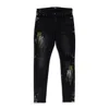 Amiri Aged Black Ma Stencil Jeans In Black