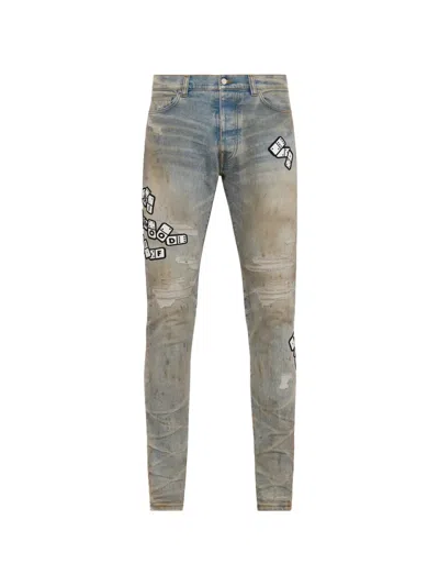 Amiri Applique Skinny Jeans In Blue