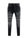 AMIRI AMIRI BANDANA THRASHER RIPPED SKINNY JEANS