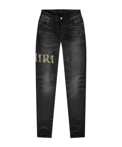 Amiri Logo Embroidered Skinny Jeans In Black