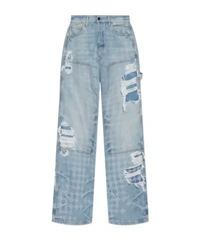 AMIRI DISTRESSED PATCHWORK JEANS