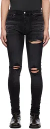 Amiri Patchwork-distressed Cotton Jeans In Black