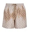 Amiri Monogram Bermuda Shorts In Beige