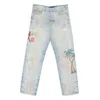 Amiri Distressed Embroidered Denim Trousers In Blue