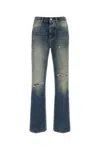 Amiri Slashed Boot Cut Jean In Blue