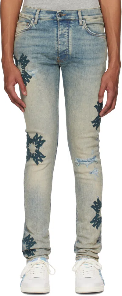 Amiri Blue Ma Quad Appliqué Skinny Jeans In Antique Indigo