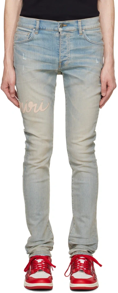 Amiri Blue Script Logo Skinny Jeans In Antique Indigo