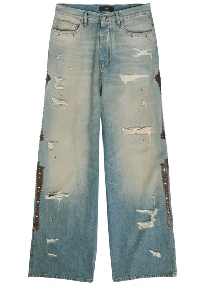 Amiri Bones Studded Distressed Relaxed Jeans In Blue