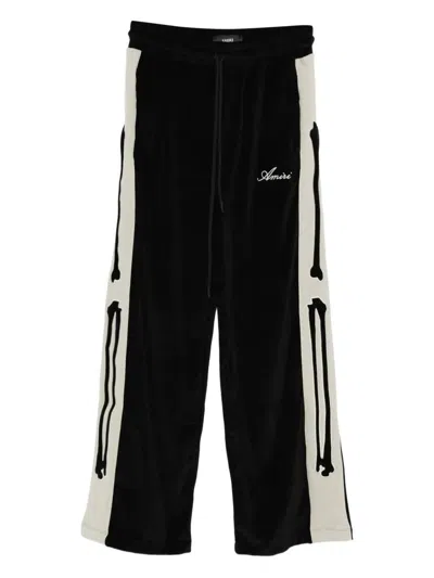 Amiri Bones Velvet-effect Track Pants In Black