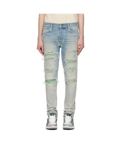 AMIRI BOUCLE THRASHER JEANS