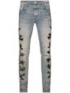 Amiri Bones-detail Slim-cut Jeans In 蓝色